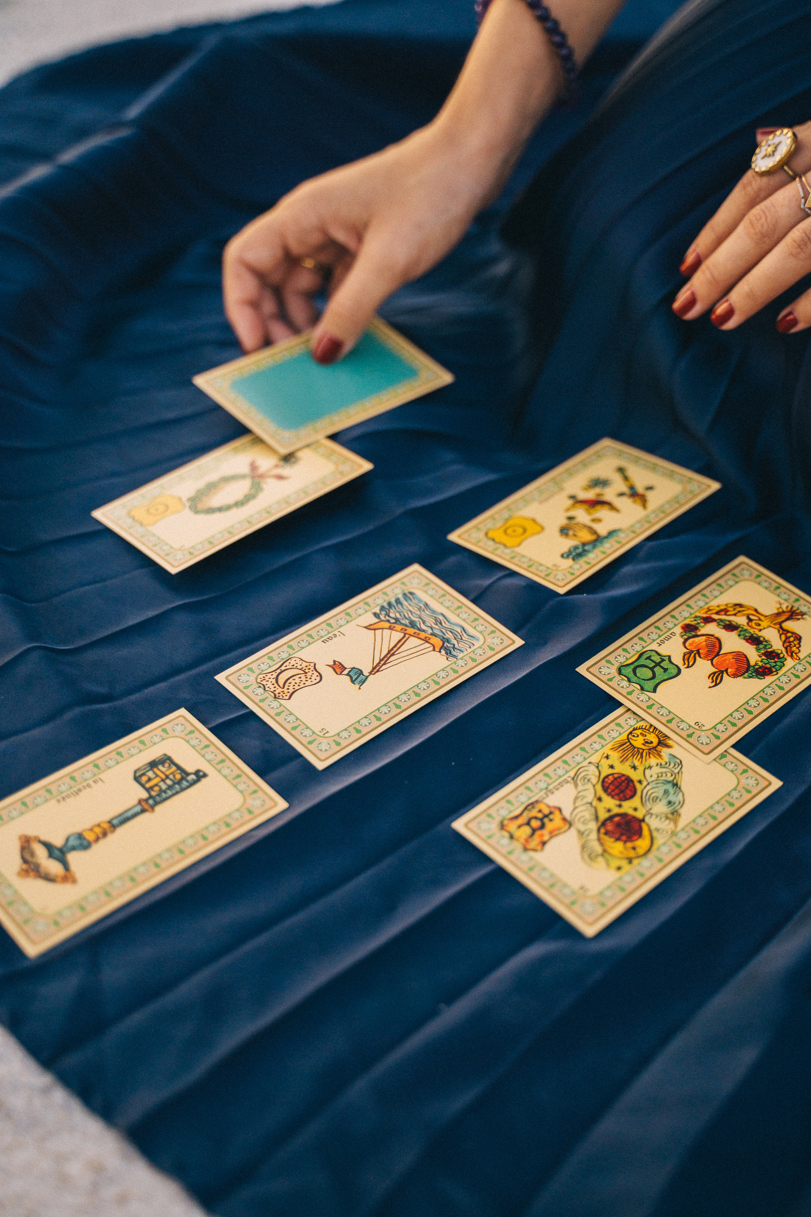 White and Yellow Cards on Blue Textile